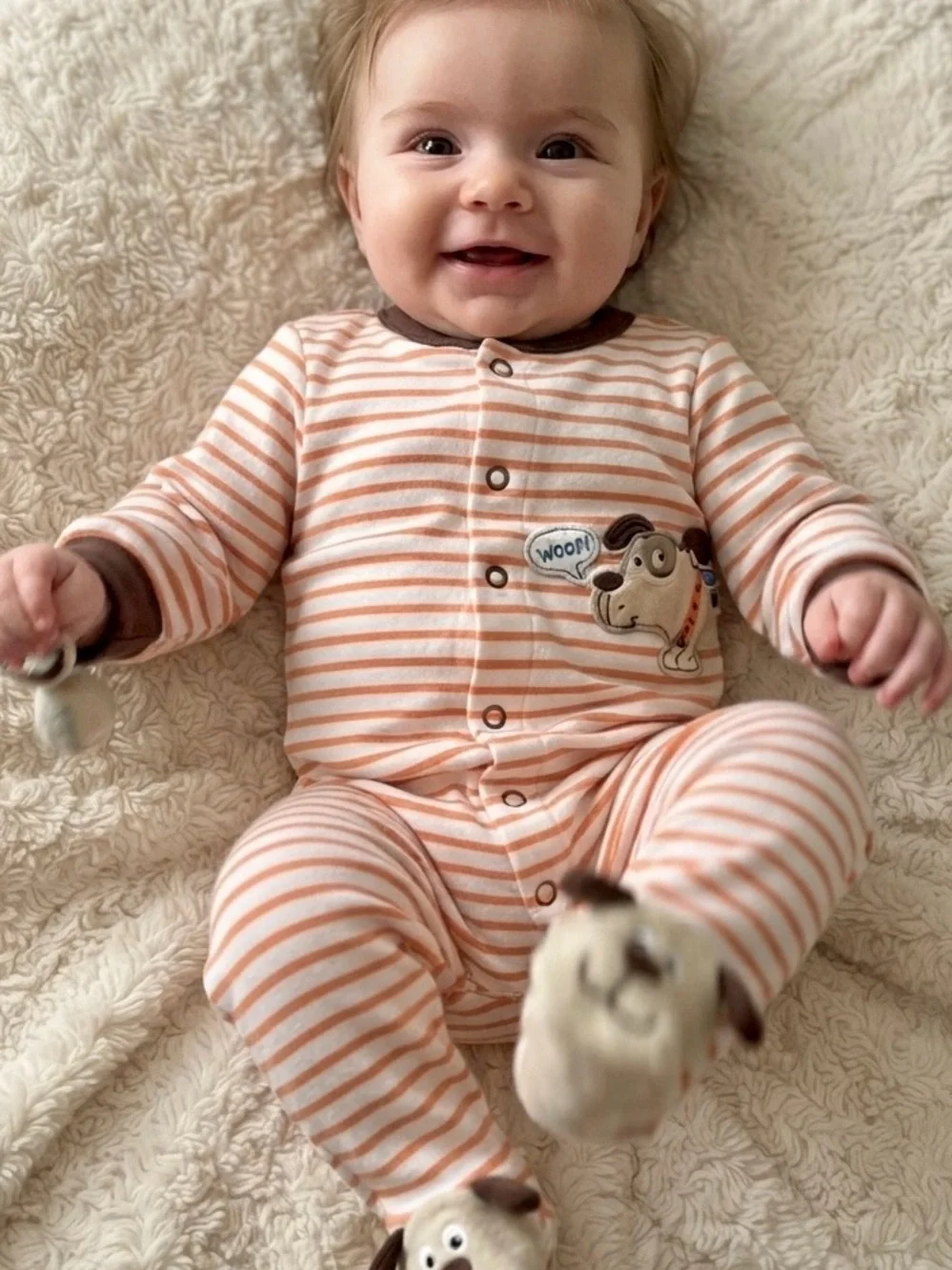 Cute as a button onesie with doggie print